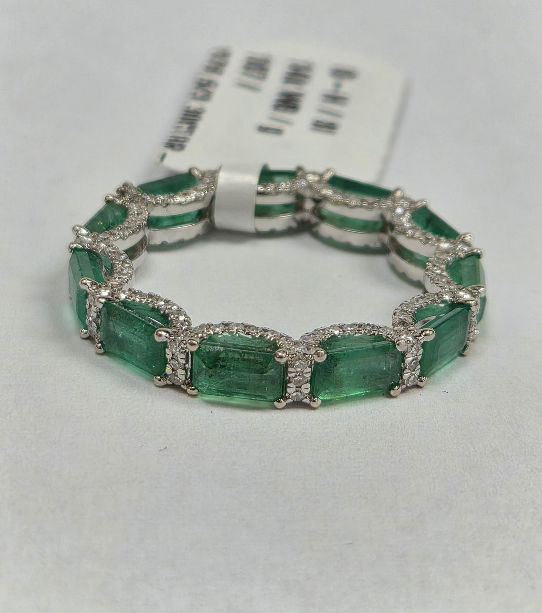 Emerald and diamond Hudson eternity band G-H/SI
