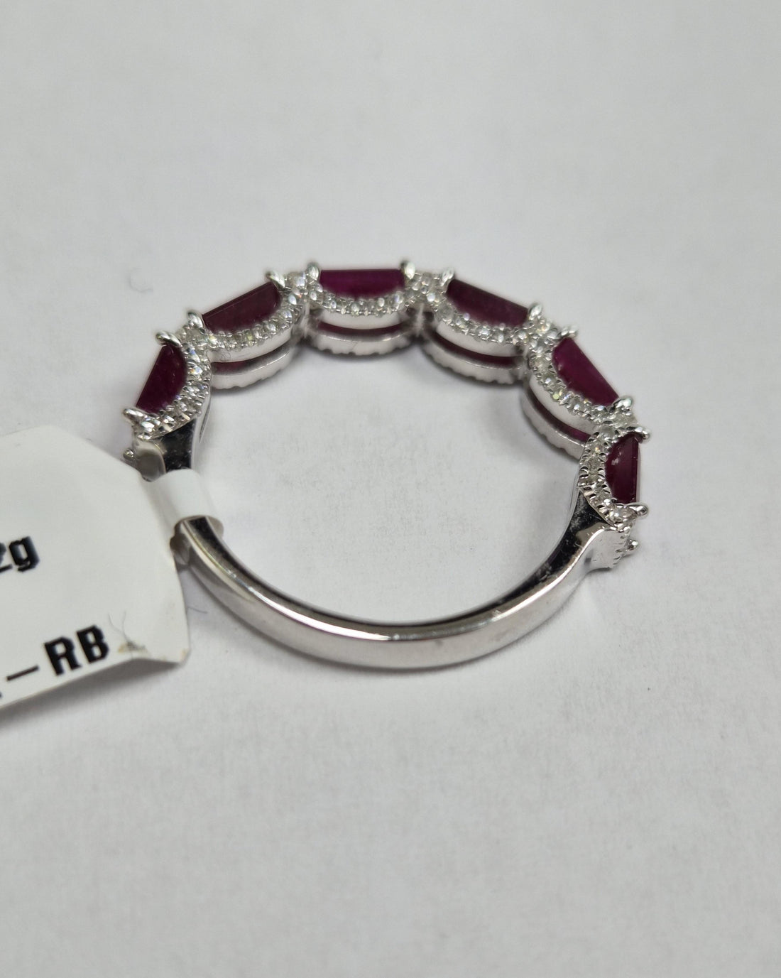 Ruby Hudson half band eternity ring