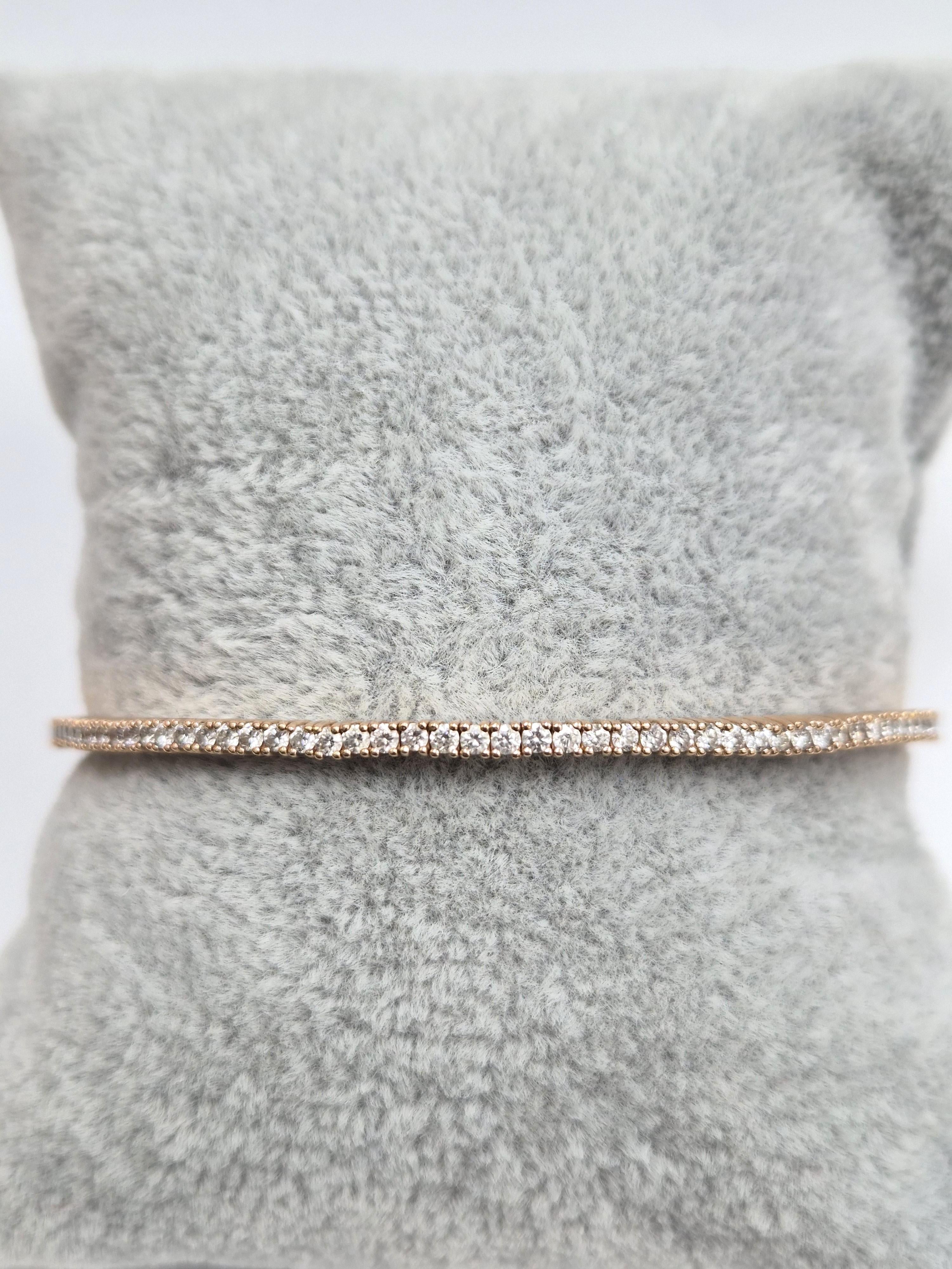 Natural 14k Rose Gold Bangle with 1.54 Carat Round White Diamonds.