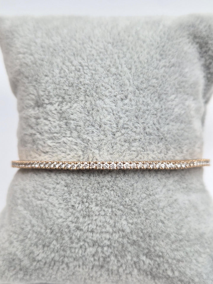 Natural 14k Rose Gold Bangle with 1.54 Carat Round White Diamonds.
