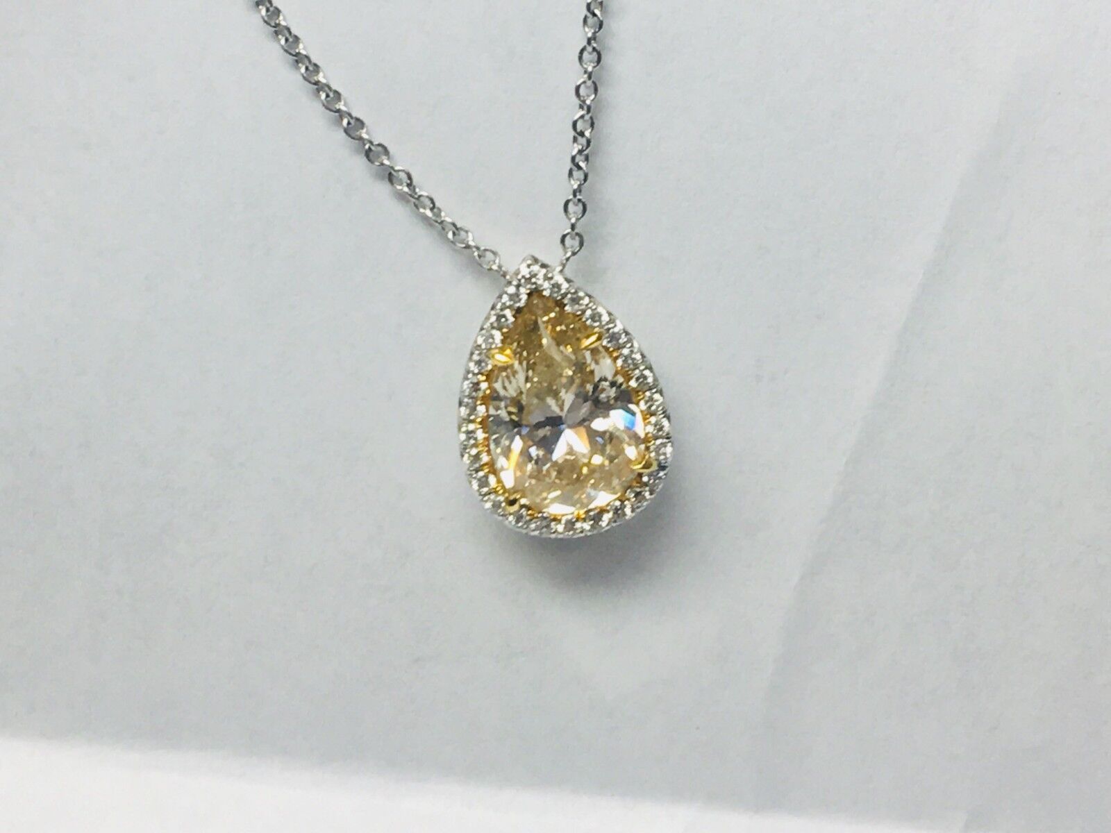 5.62 carat canary yellow pear shape diamond pendant