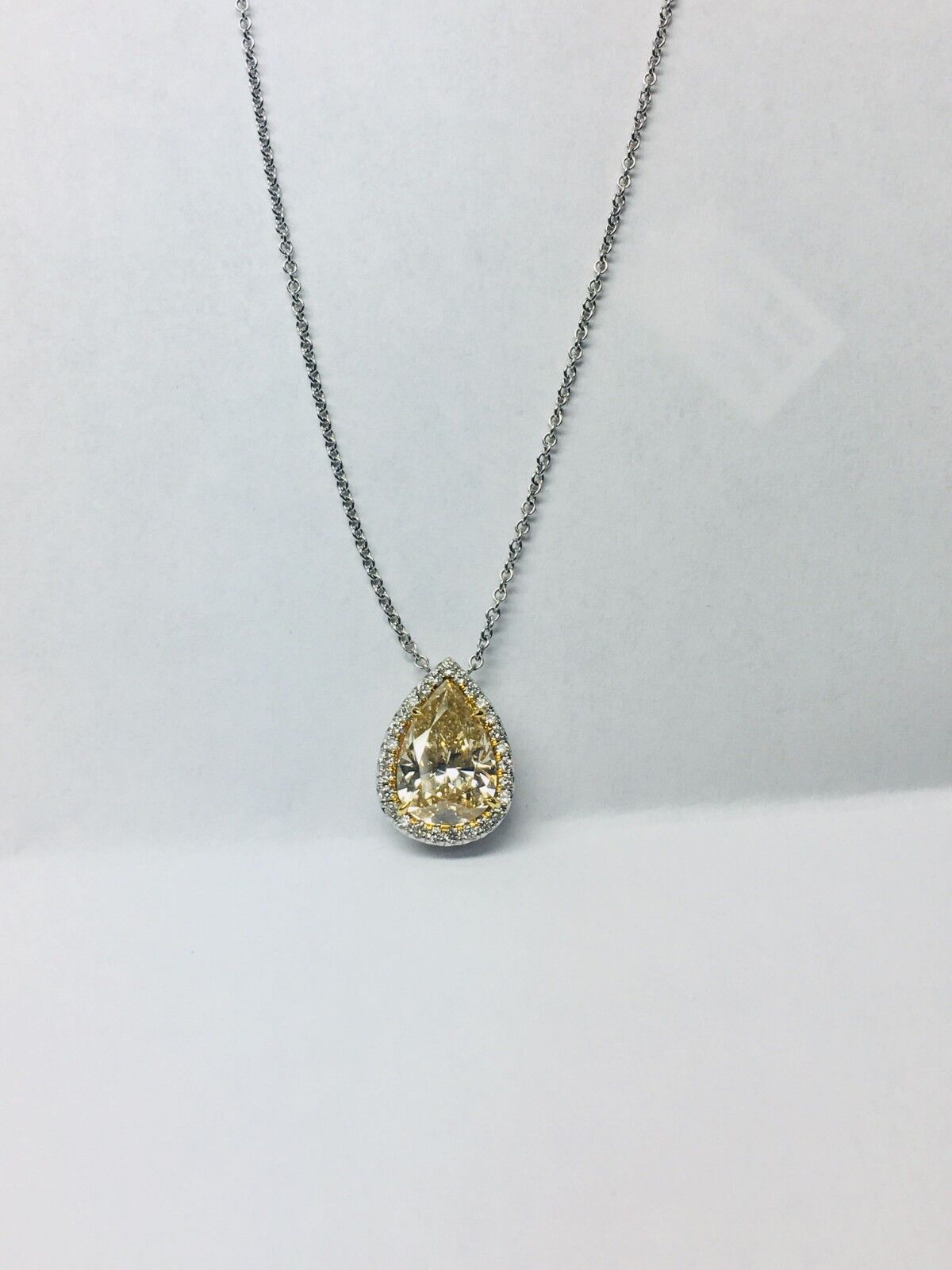 5.62 carat canary yellow pear shape diamond pendant