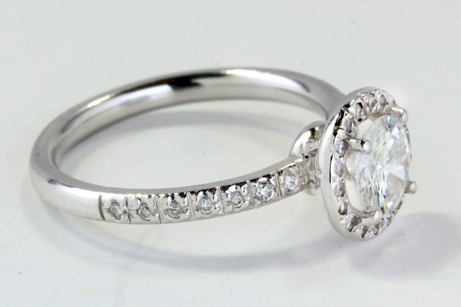 Halo Diamond Engagement Ring with 1.35 total Carat Weight in 14k White Gold
