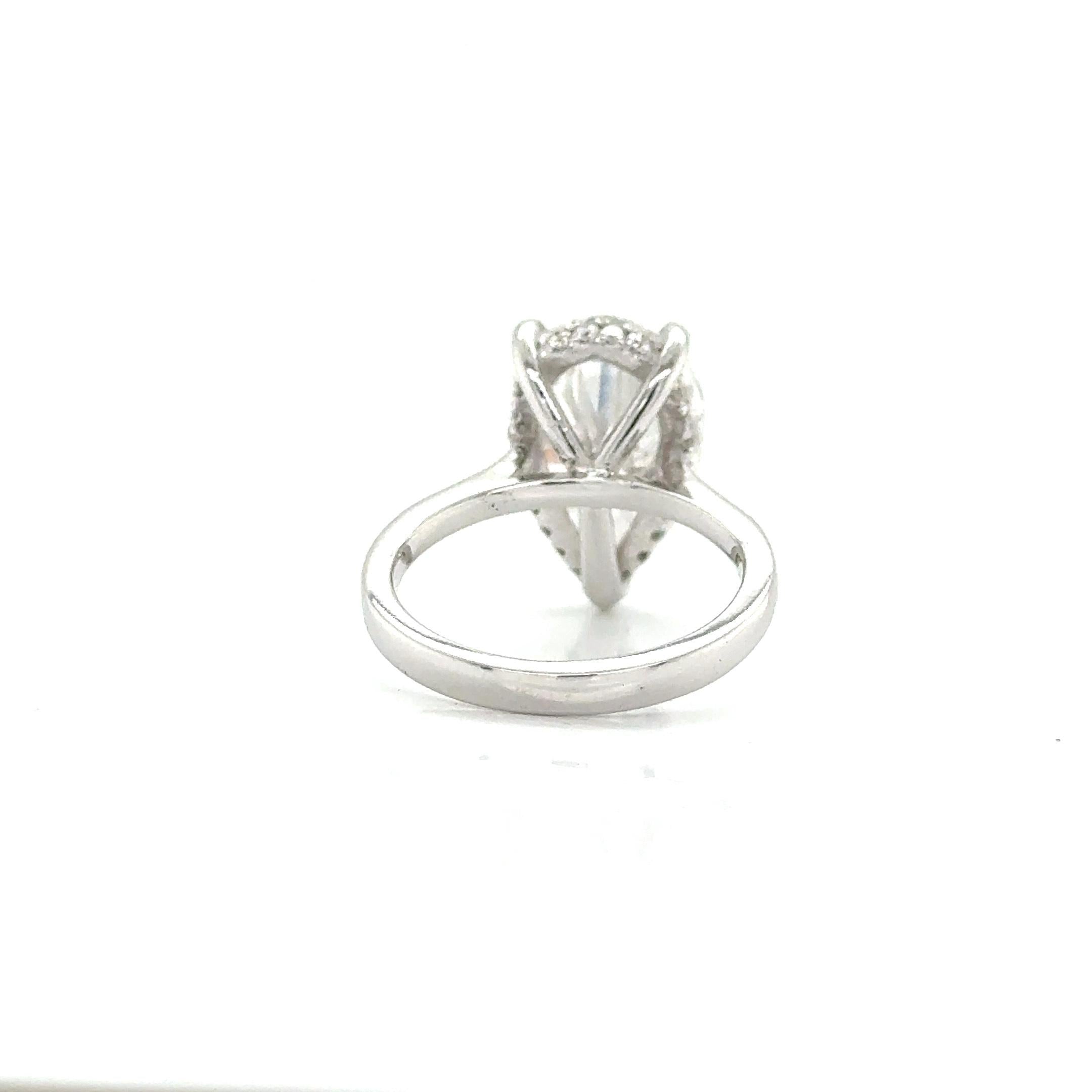 Lab-Grown 6.09ct Oval-Cut Diamond Ring in 14K W/G with Halo of Smaller Diamonds