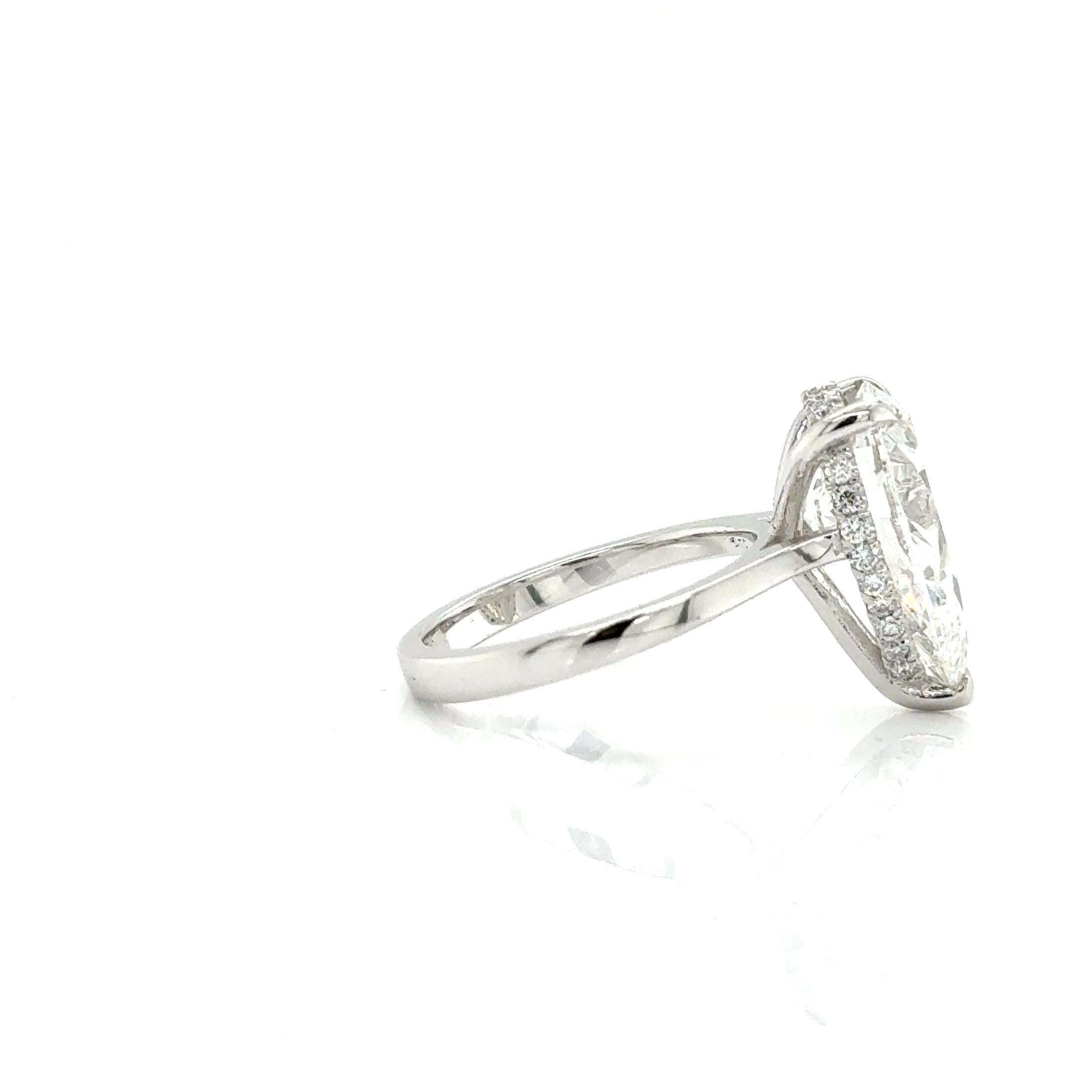 Lab-Grown 6.09ct Oval-Cut Diamond Ring in 14K W/G with Halo of Smaller Diamonds